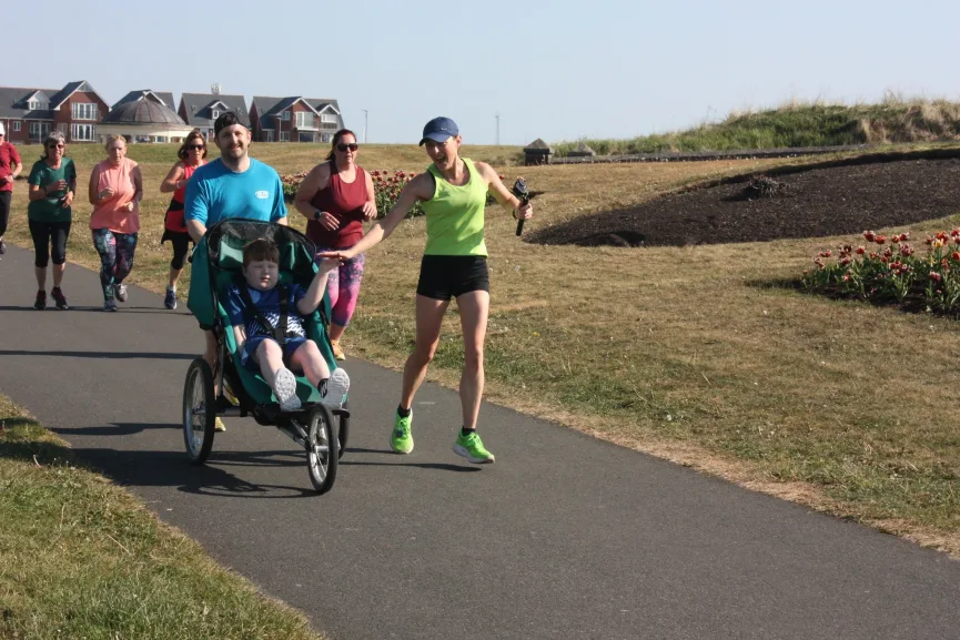 Running Dad completing Blyth Links parkrun with buggy on 10 May 2025
